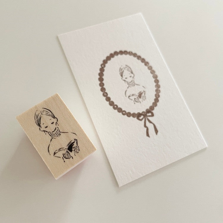 Pieczątka | Czytająca dziewczynka