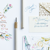 Pióro maczane | comoji