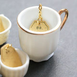 Mosiężna zawieszka LCN Design Studio | Blind Box 2026 | Tea Time